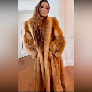 Full length fox fur coat purchase in Aspen CO. worn 1 time.